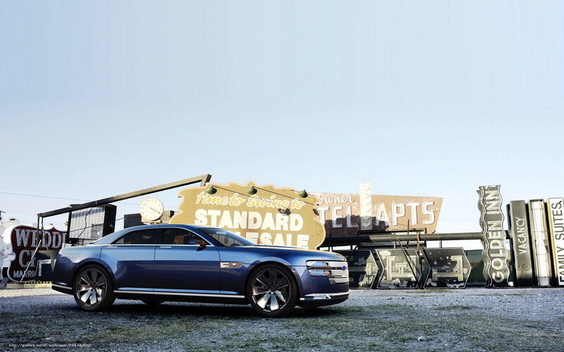 Blue concept car in front of vintage signs