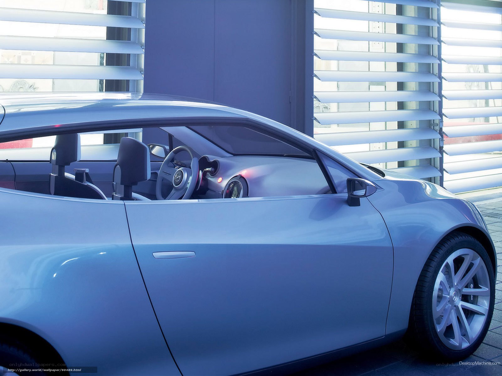 Blue concept car in showroom