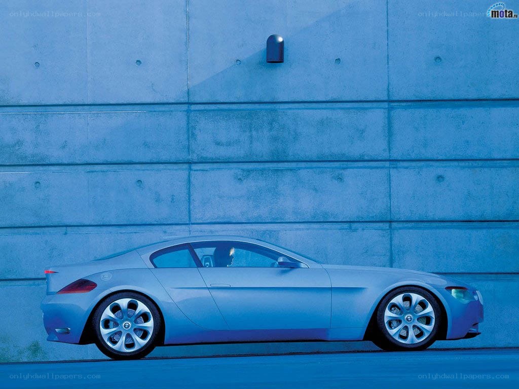 Blue concept car on concrete wall