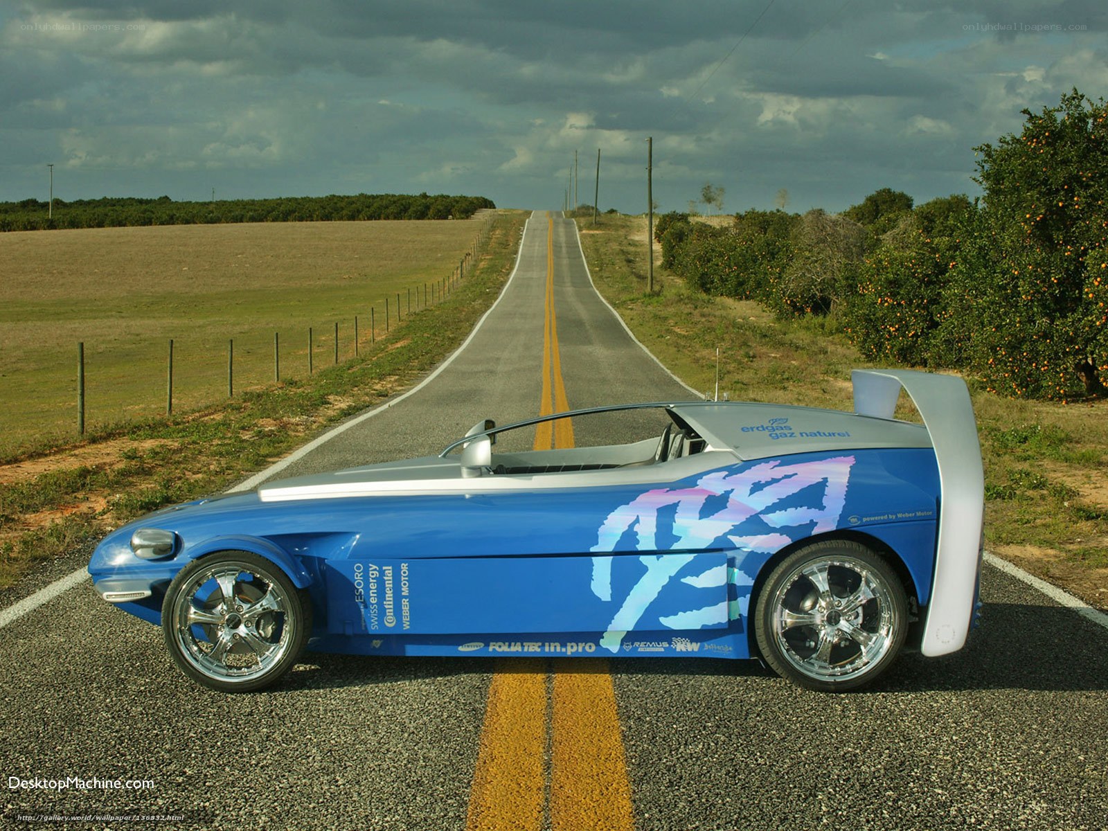 Blue concept car on country road