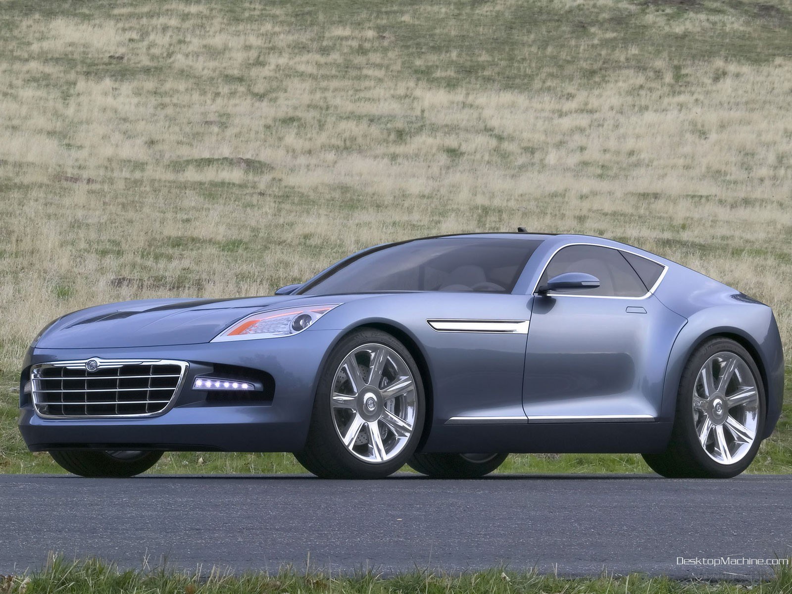 blue concept car on road
