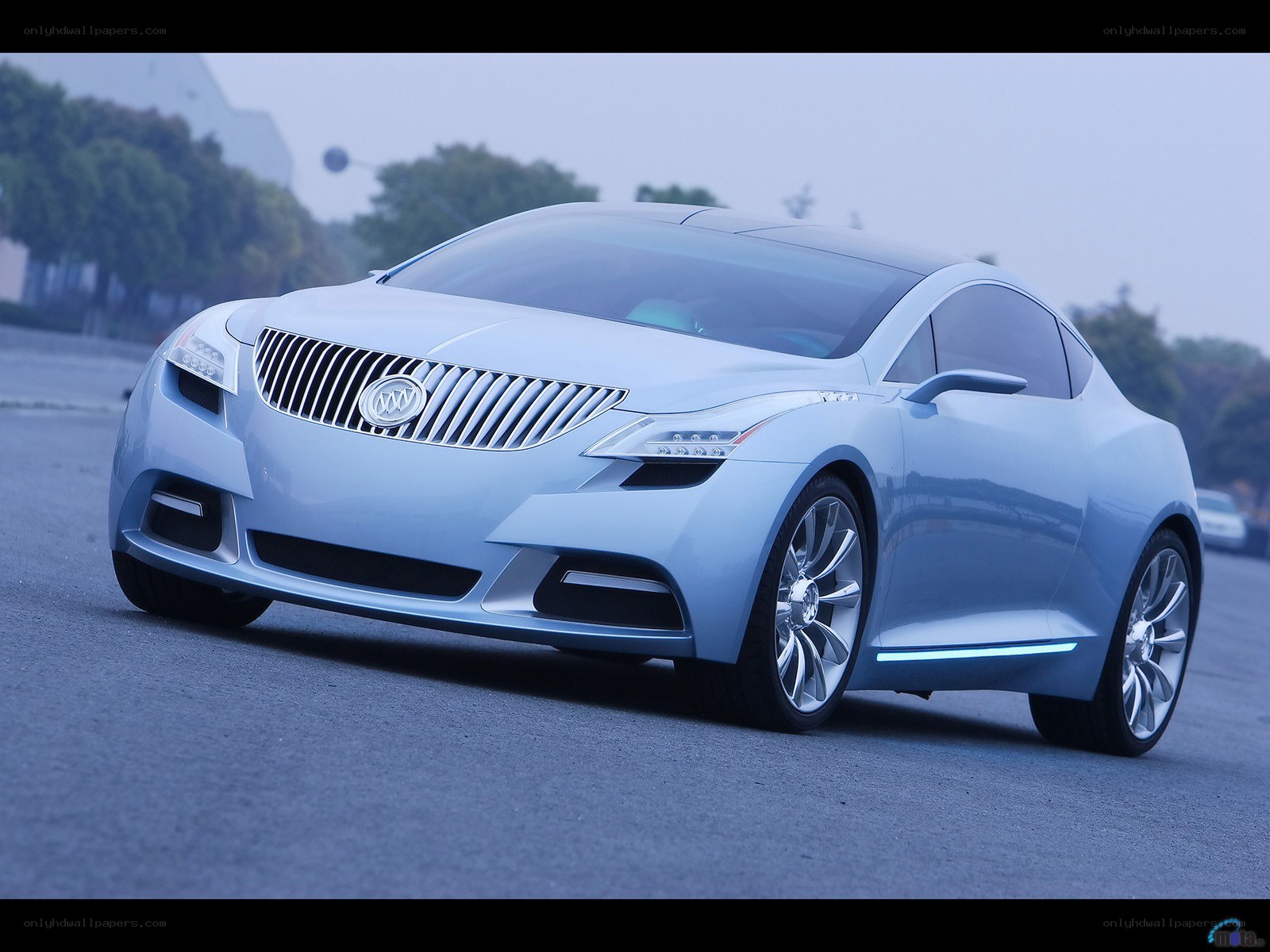 blue concept car on road