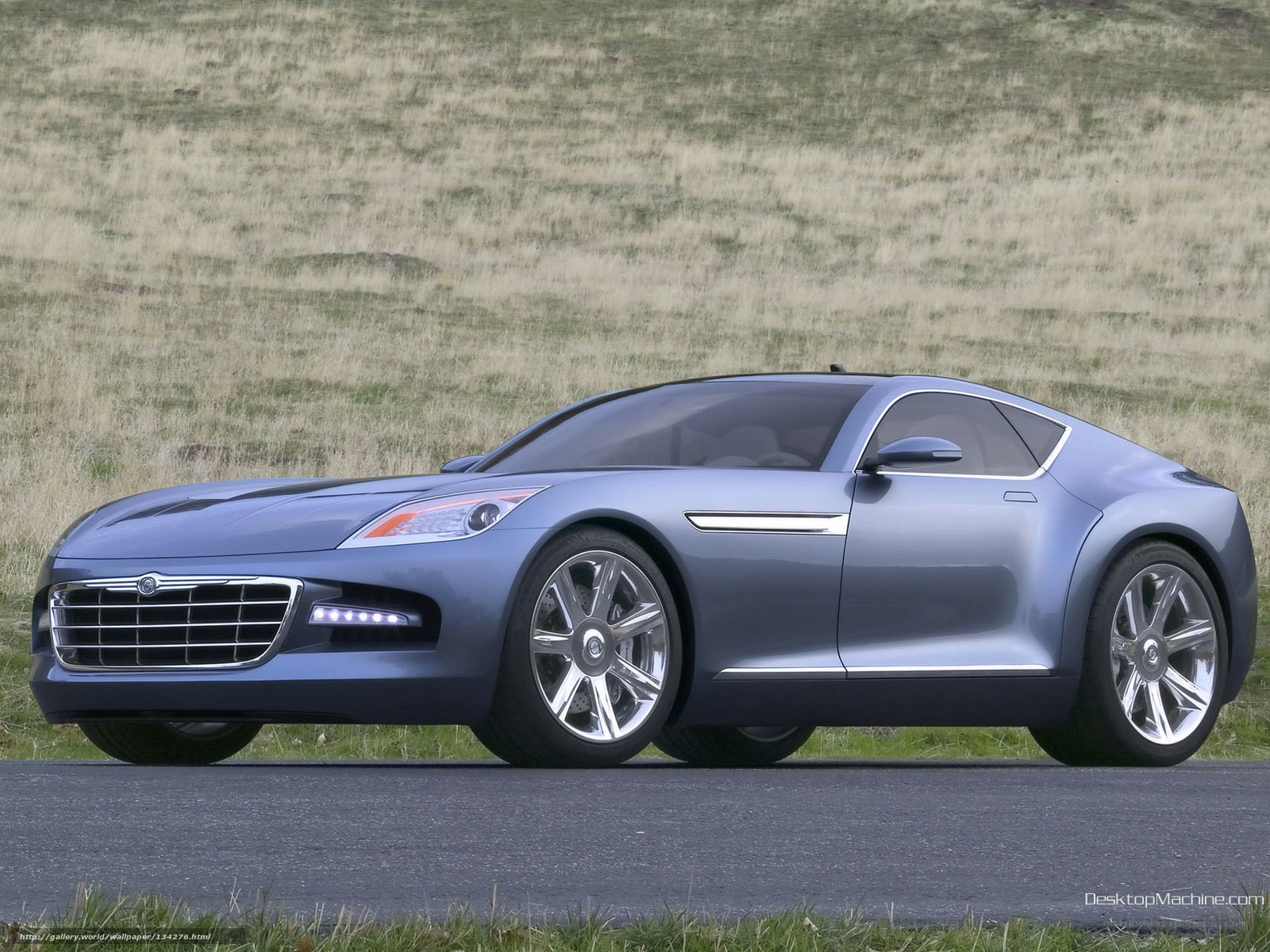 blue concept car on road