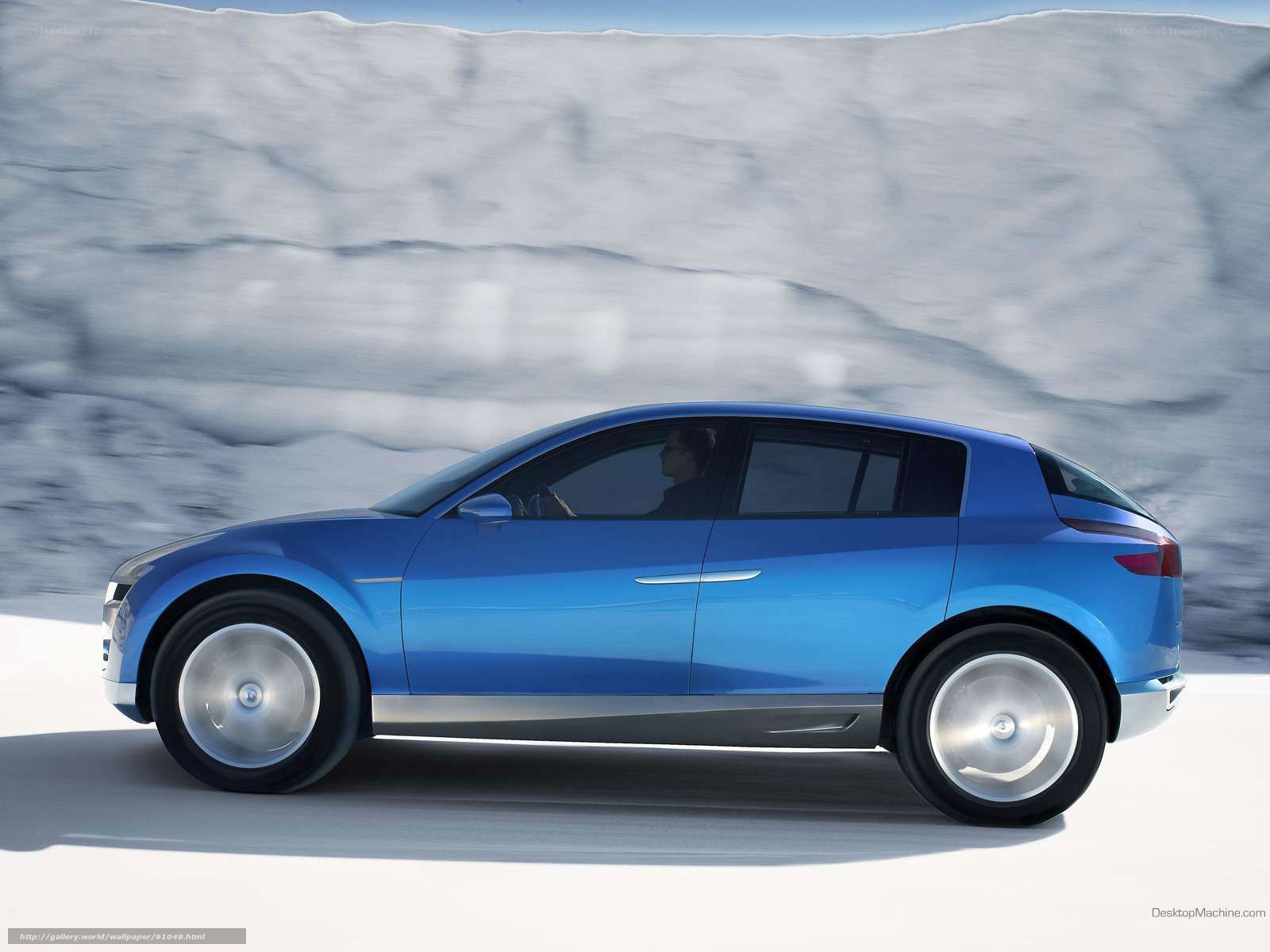 blue concept car on snowy terrain