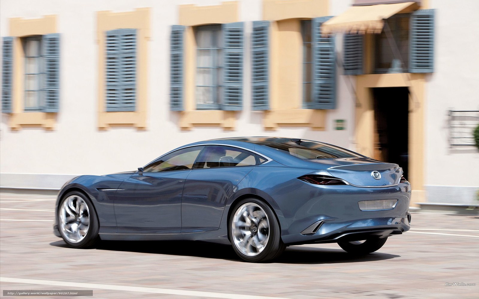blue concept car on street