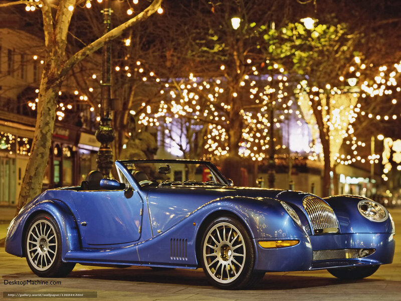 Blue convertible car at night