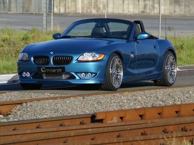 Blue Convertible Car — Calm, Afternoon, Photograph, Railroad Tracks