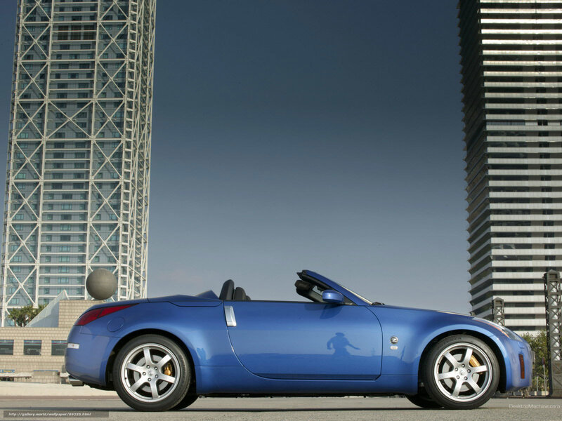 Blue Convertible Car — Dramatic, Afternoon, Photograph, Tall Buildings