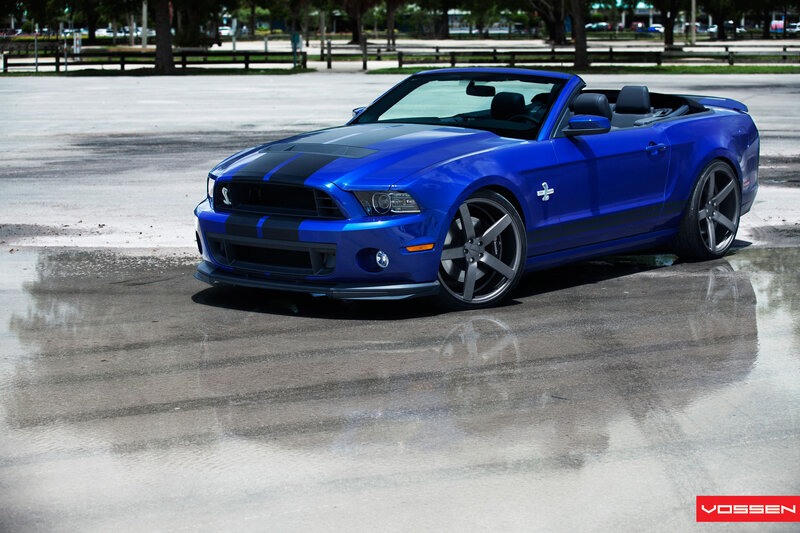 Blue Convertible Car — Dramatic, Afternoon, Photograph, Wet Pavement