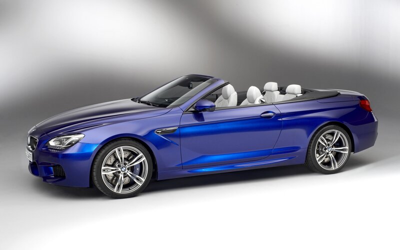 Blue Convertible Car — Dramatic, Photograph, White Seats, Silver Wheels
