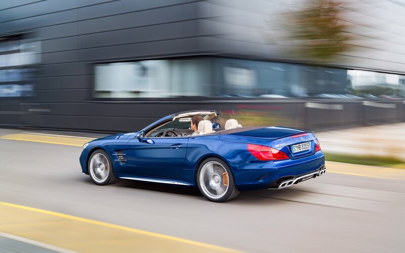Blue Convertible Car — Dynamic, Afternoon, Photograph, Driver, Building