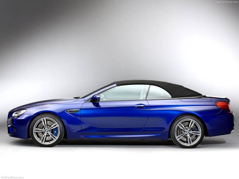 Blue Convertible Car — Neutral, Photograph, Black Soft Top, Silver Wheels