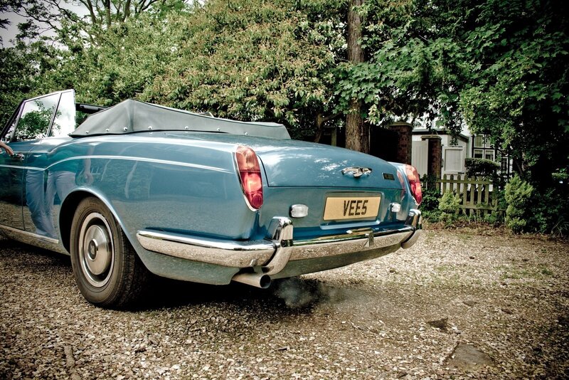 blue convertible car parked
