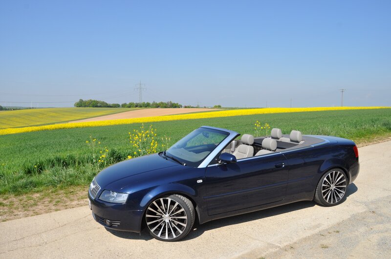 Blue Convertible Car — Serene, Afternoon, Photograph, Field, Flowers