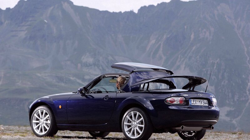 Blue Convertible Car — Serene, Afternoon, Photograph, Person