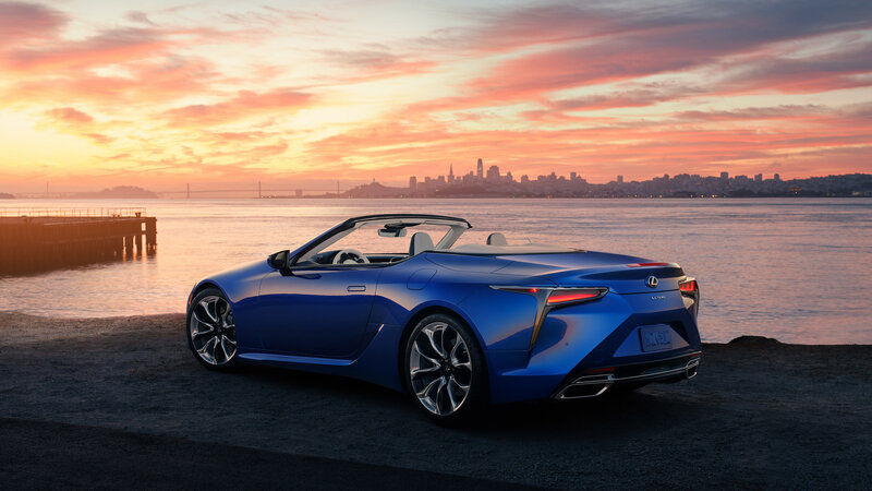 Blue Convertible Car — Serene, Sunset, Photograph, City Skyline