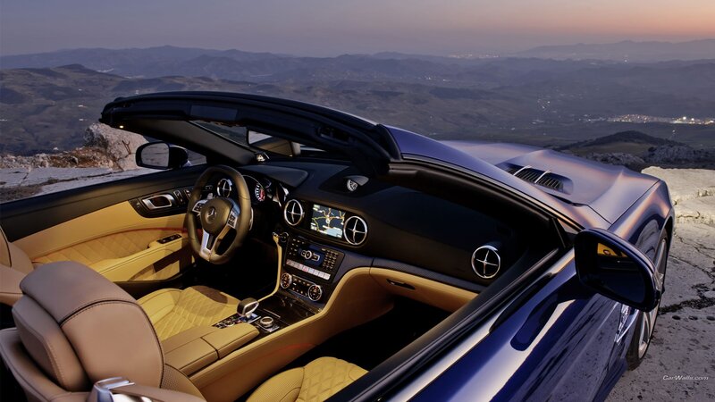 Blue Convertible Car — Serene, Sunset, Photograph, Mountains, Dashboard, Leather Seats