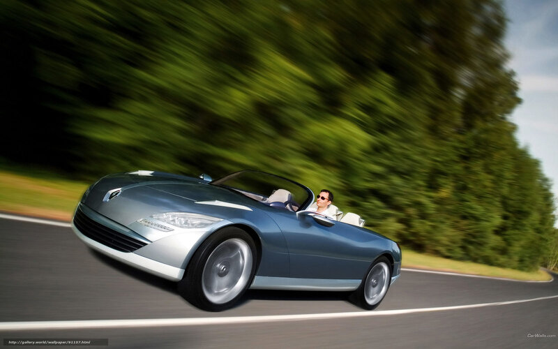 Blue convertible sports car on road