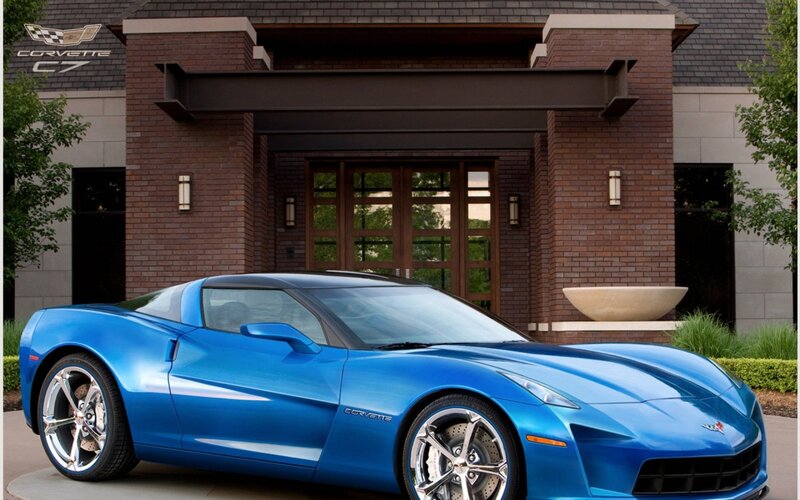 Blue Corvette C7 in front of building