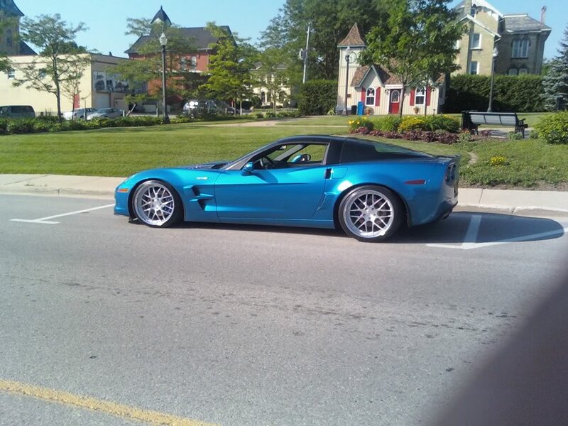 Blue Corvette Car — Calm, Afternoon, Photograph, Bench