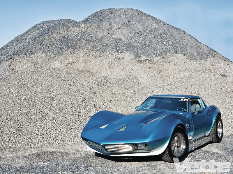 Blue Corvette Car — Dramatic, Afternoon, Photograph, Gravel Pile