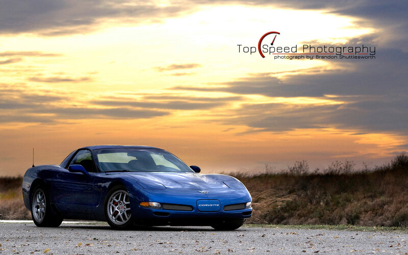 Blue Corvette Car — Dramatic, Sunset, Photograph, Sky