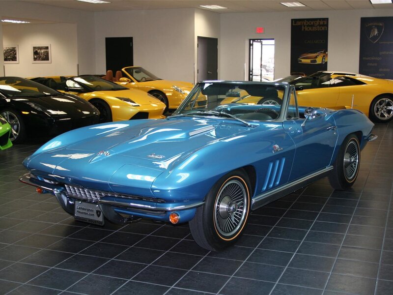 Blue Corvette in a car showroom