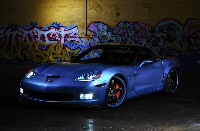 Blue Corvette in graffiti alley