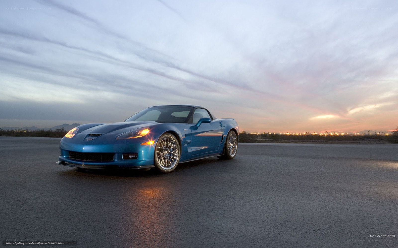 Blue Corvette on a desert road