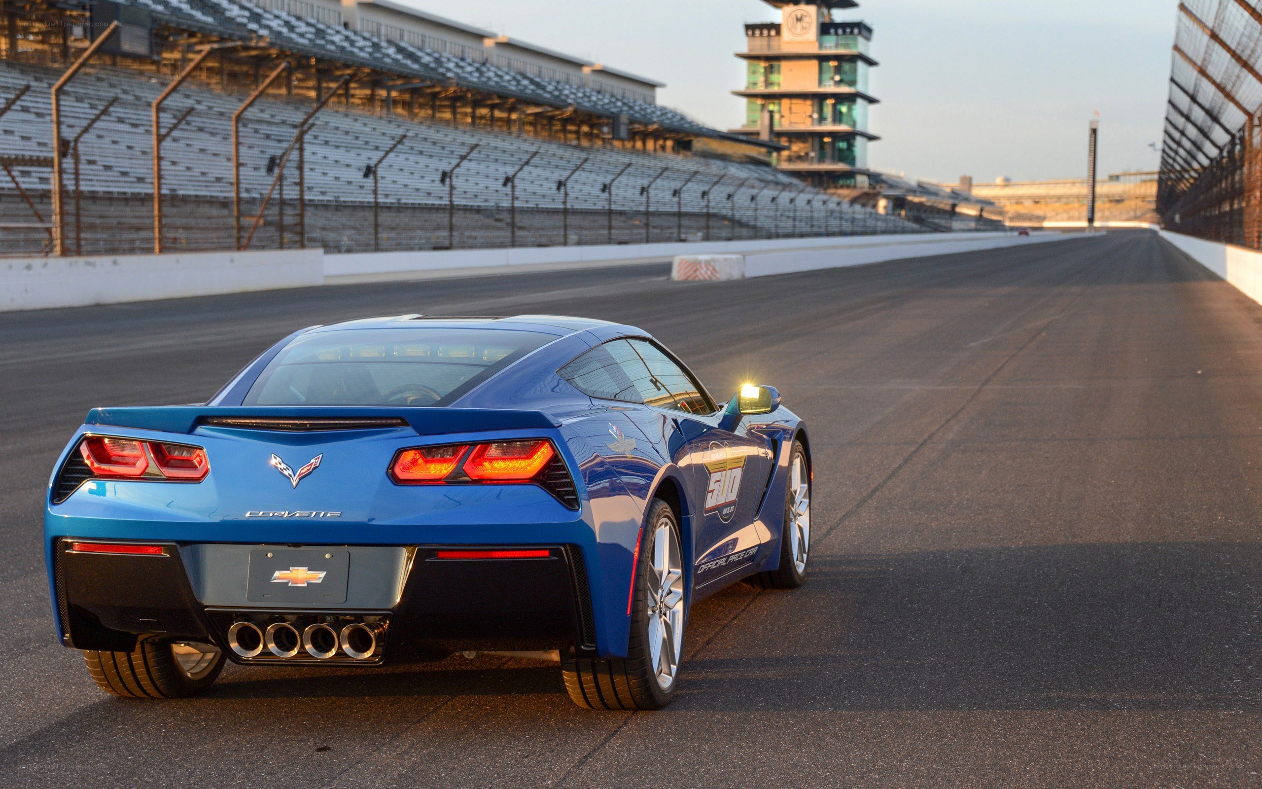 Blue Corvette on a racetrack