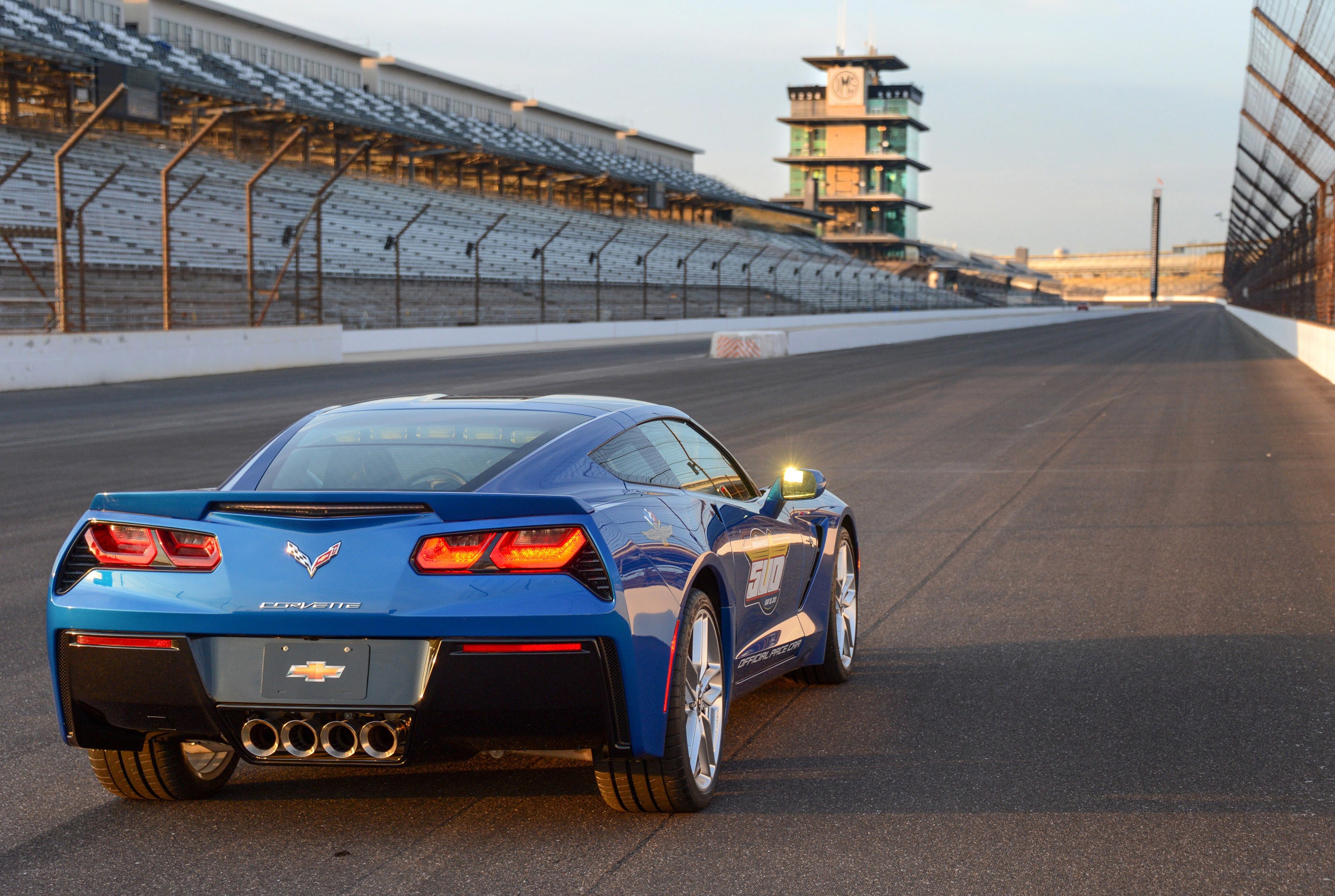 Blue Corvette on a racetrack