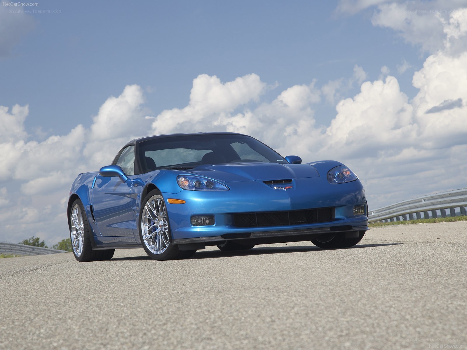 blue corvette on a road