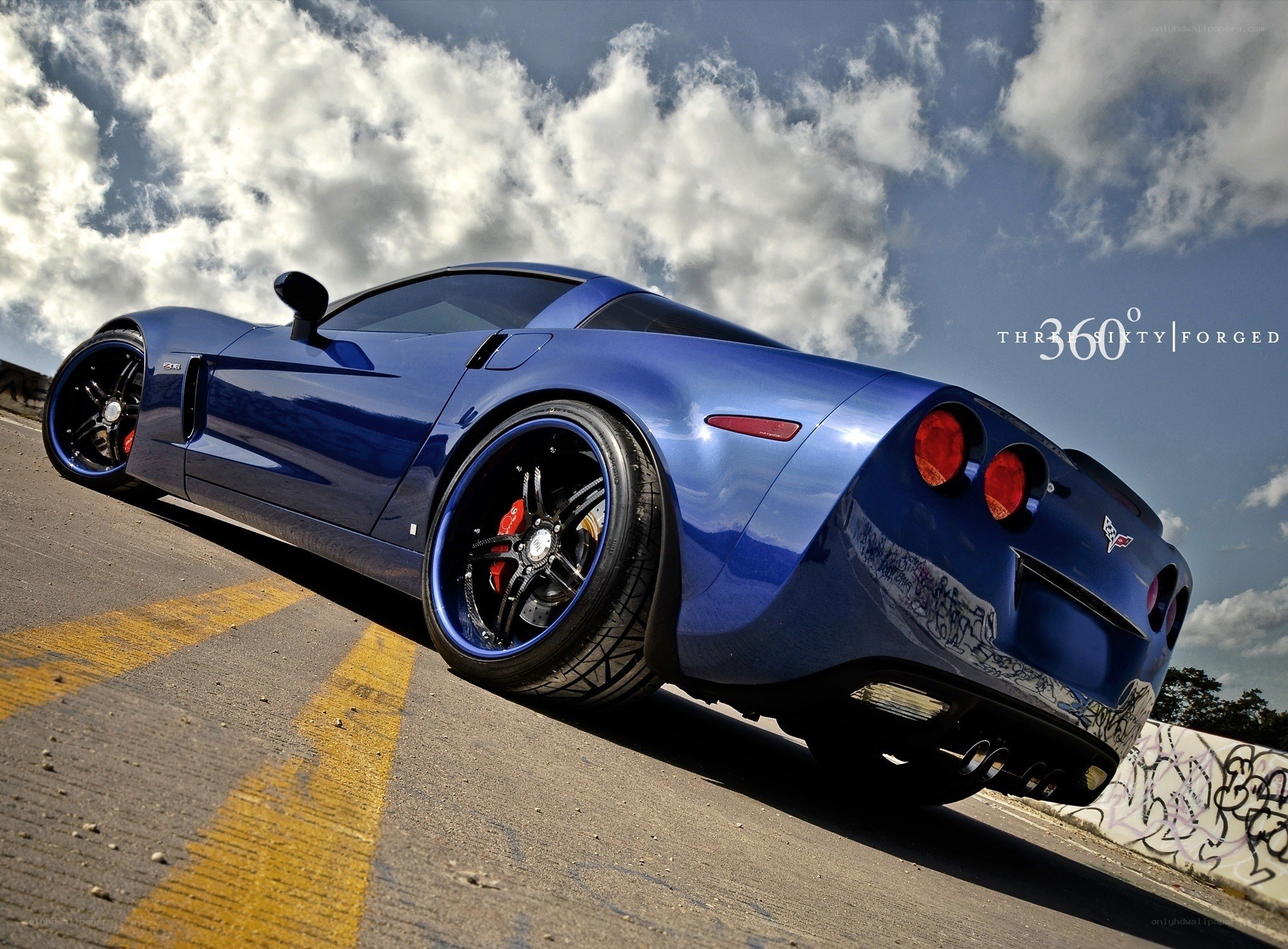 Blue Corvette on a road