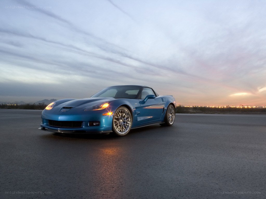 blue corvette on a road
