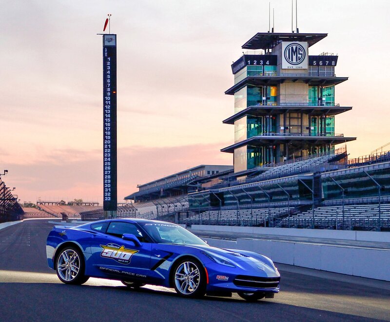 Blue Corvette on Racetrack — Dramatic