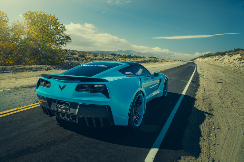 Blue Corvette on Road — Dramatic