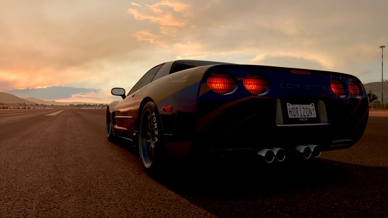 Blue Corvette on Track — Black