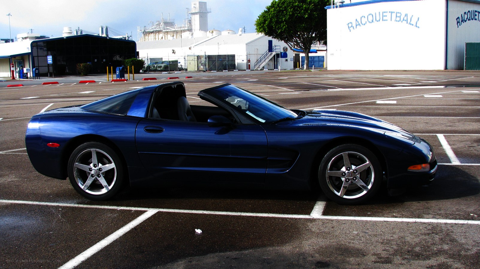Blue Corvette parked in lot