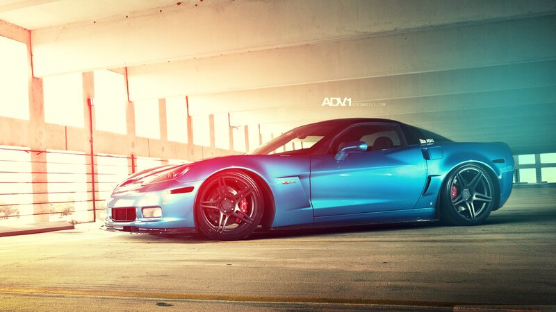 Blue Corvette Sports Car — Dramatic, Sunset, Photograph, Concrete Structure