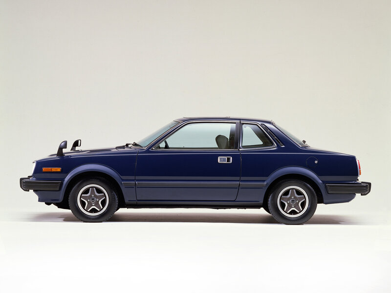 Blue Coupe Car — Neutral, Photograph, Wheels