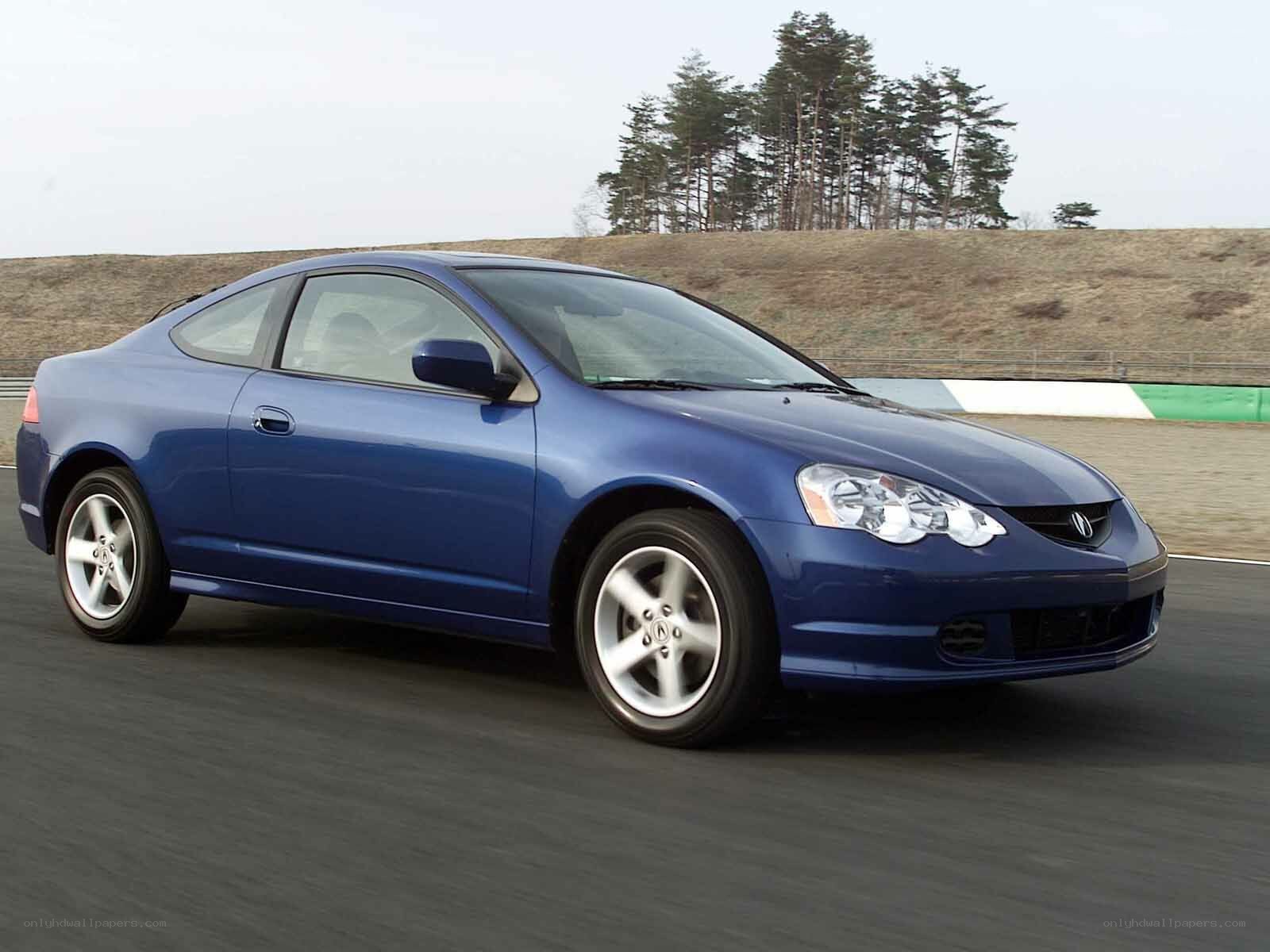 blue coupe on a racetrack