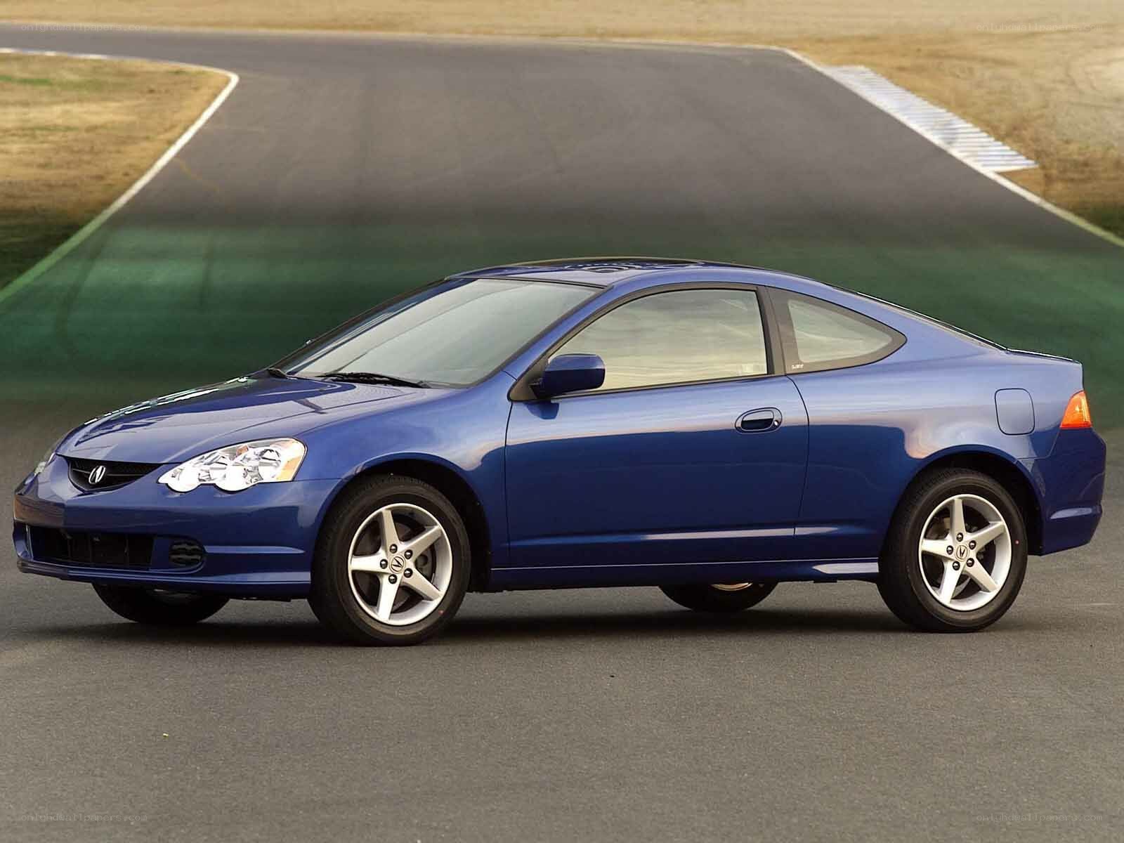 blue coupe on racetrack