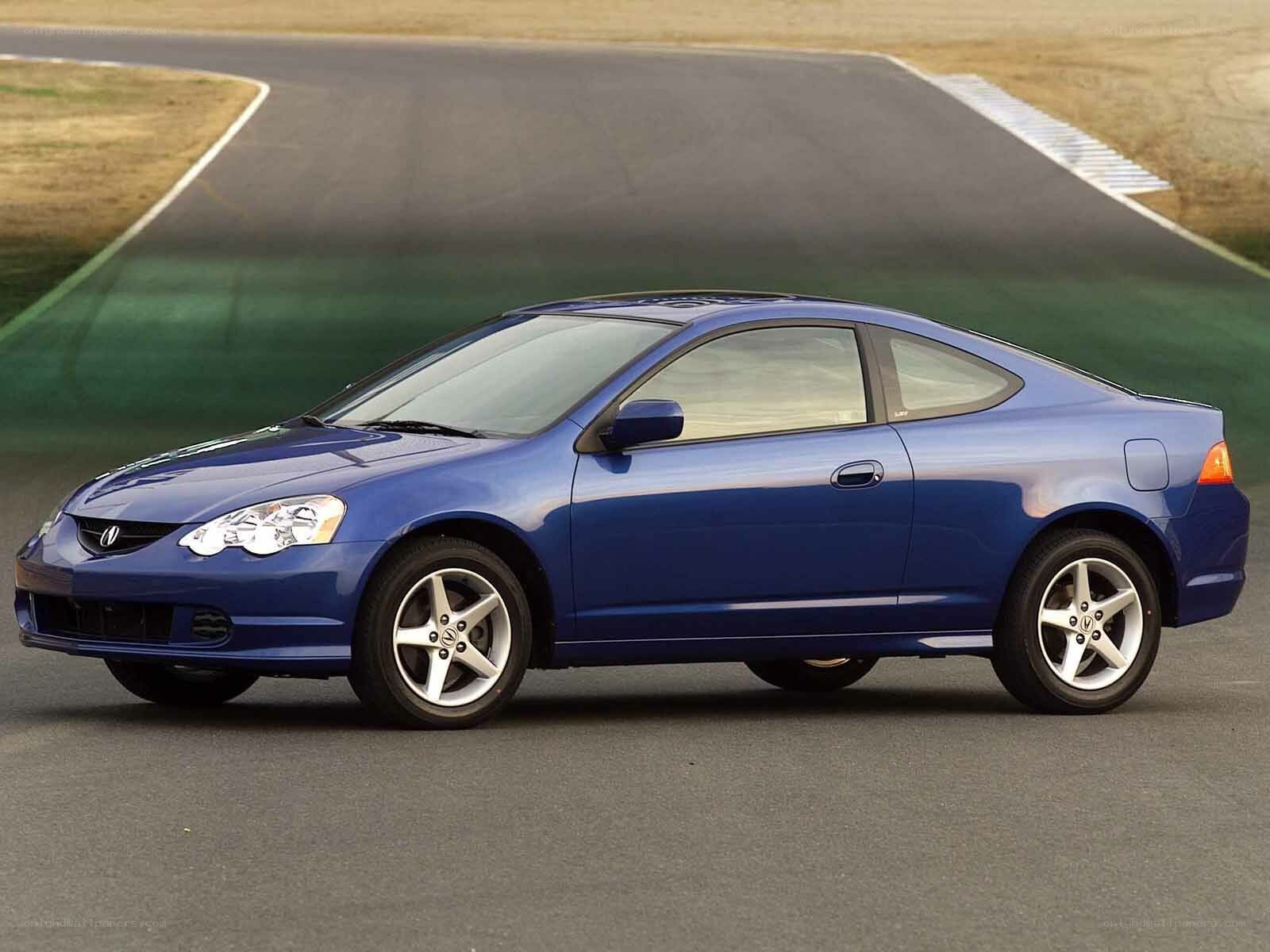 blue coupe on racetrack