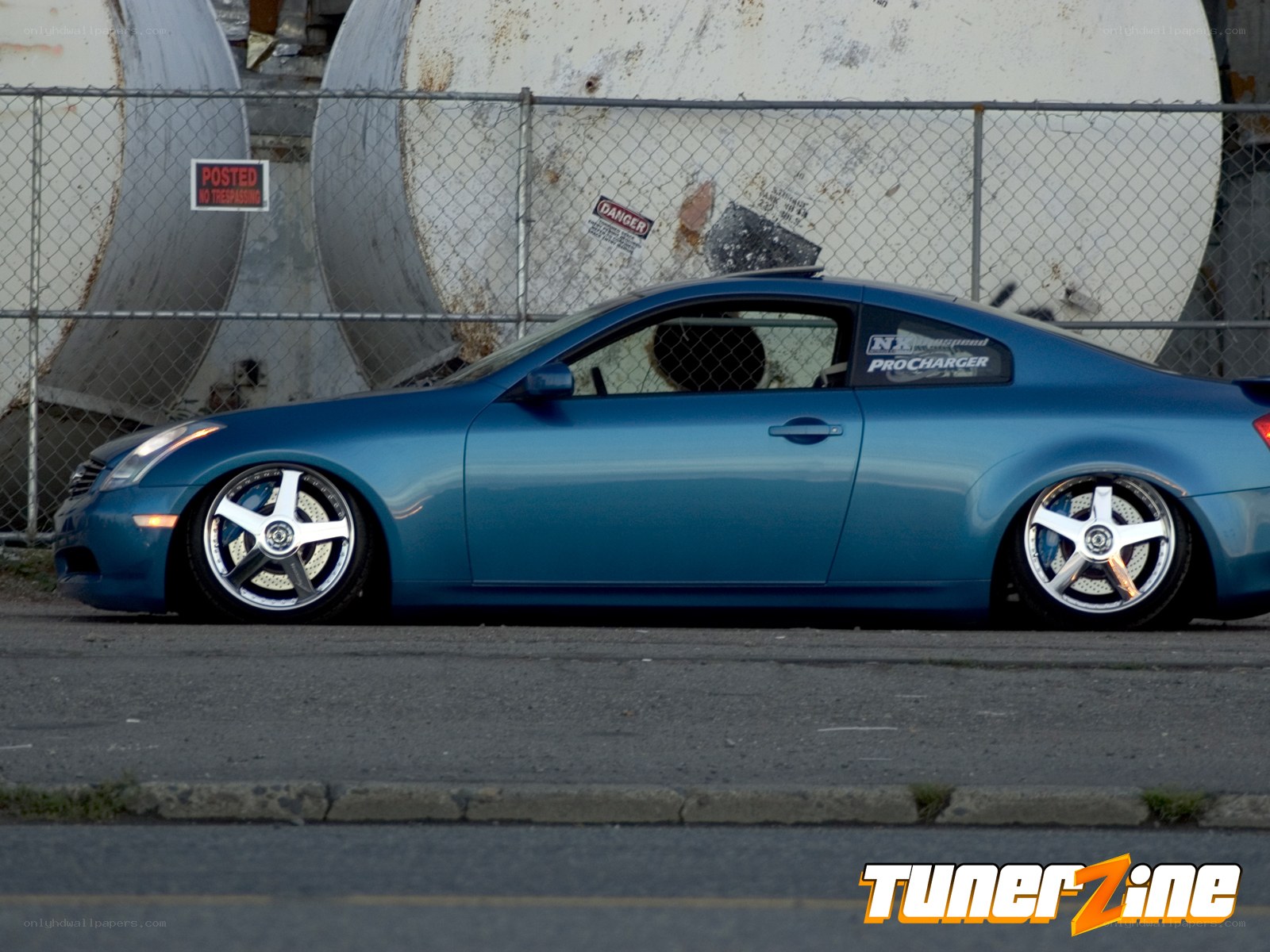 blue coupe with custom wheels