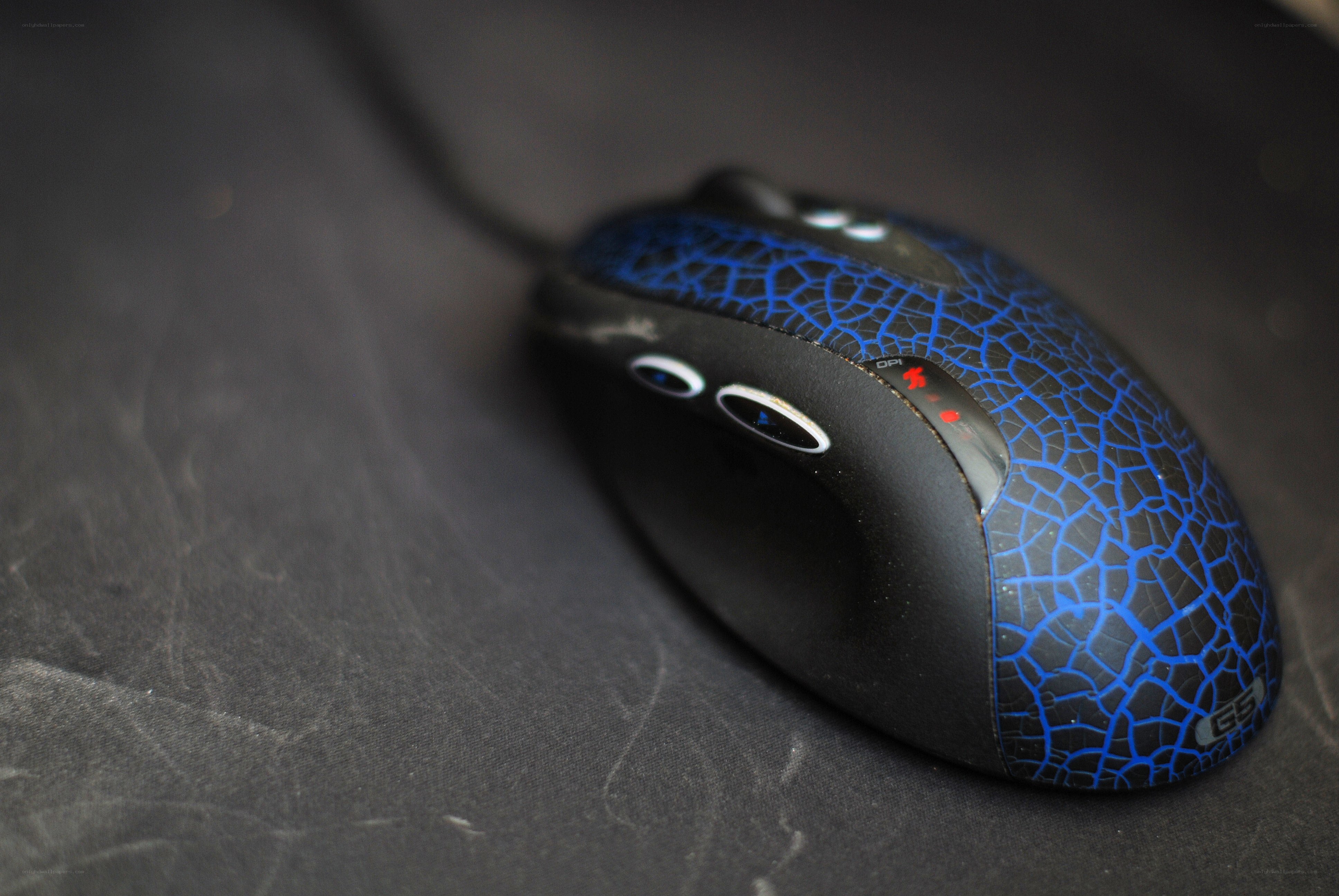 blue cracked mouse on desk