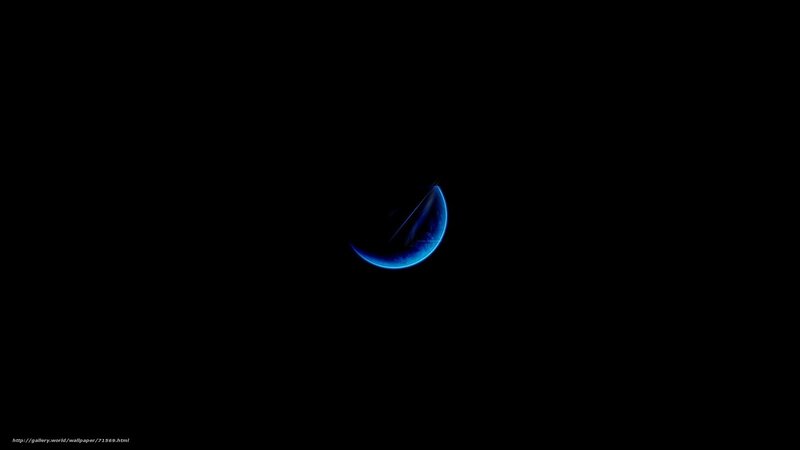 blue crescent in darkness