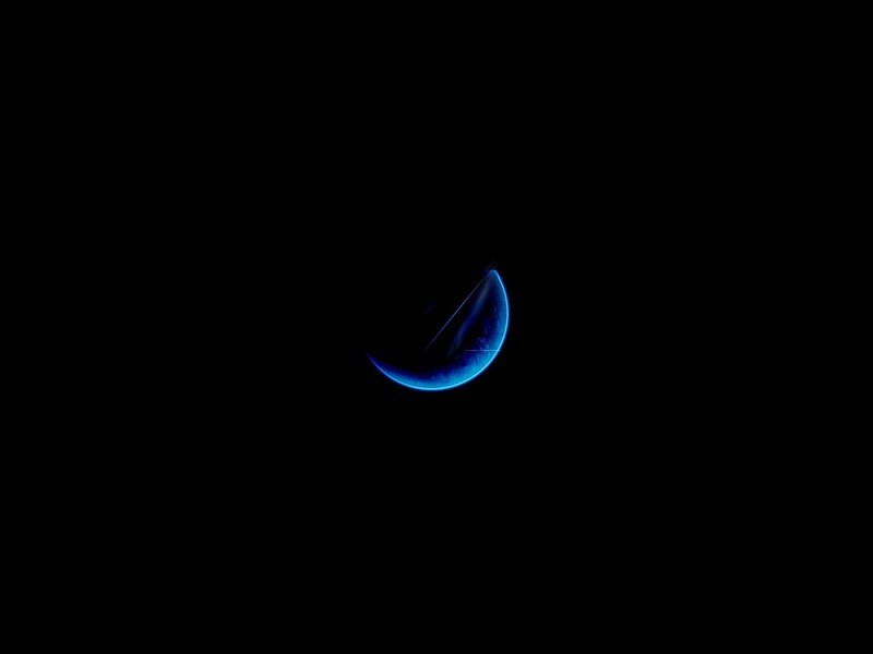Blue Crescent Planet