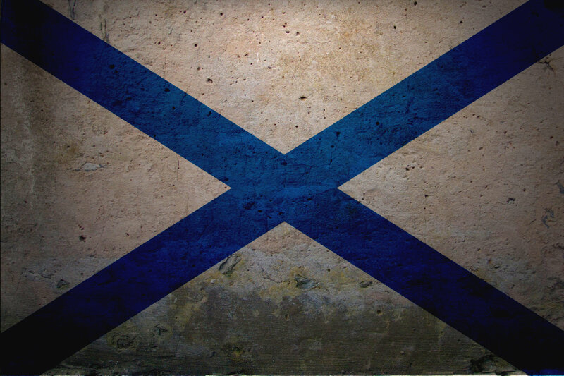 blue cross on concrete wall