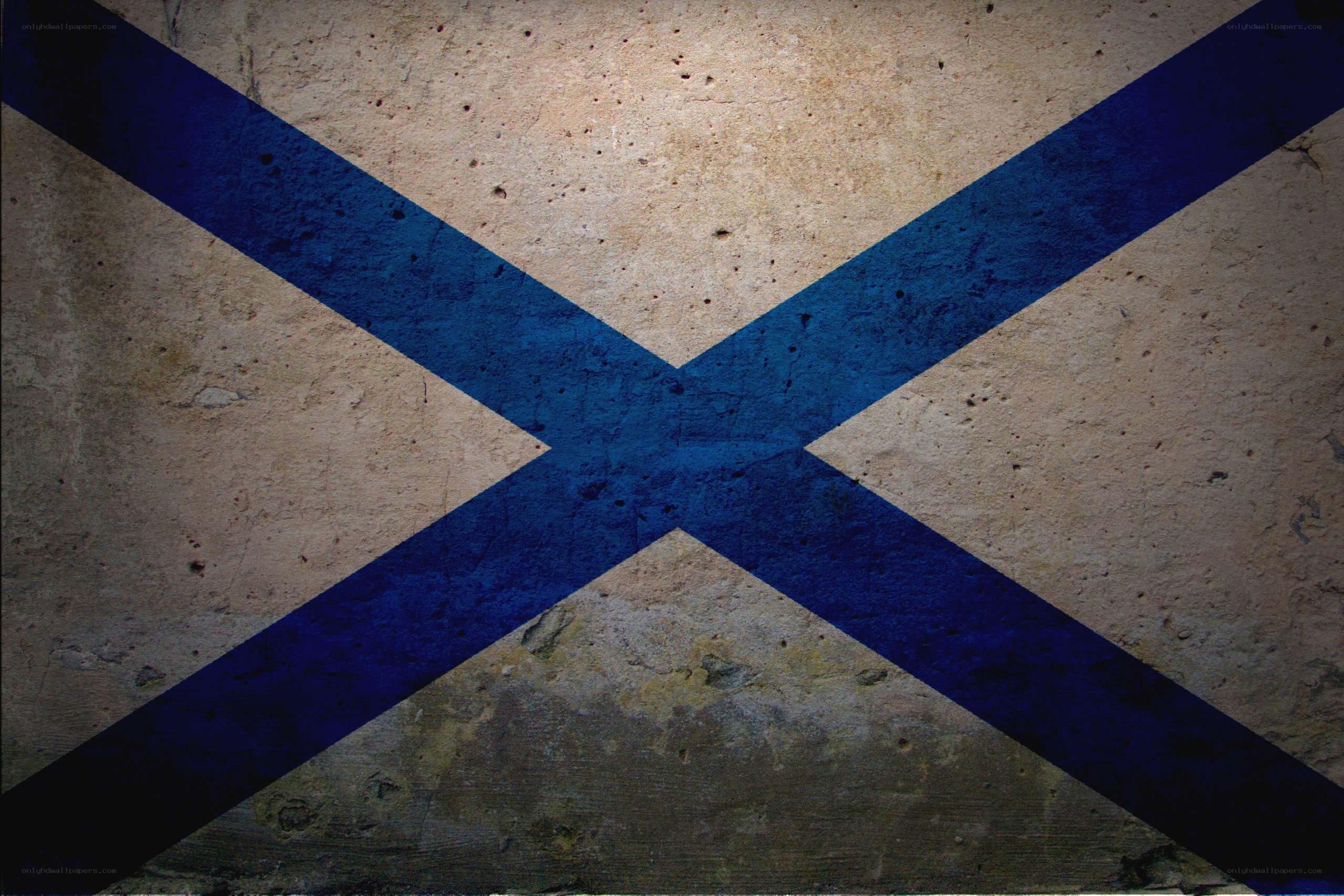 blue cross on concrete wall