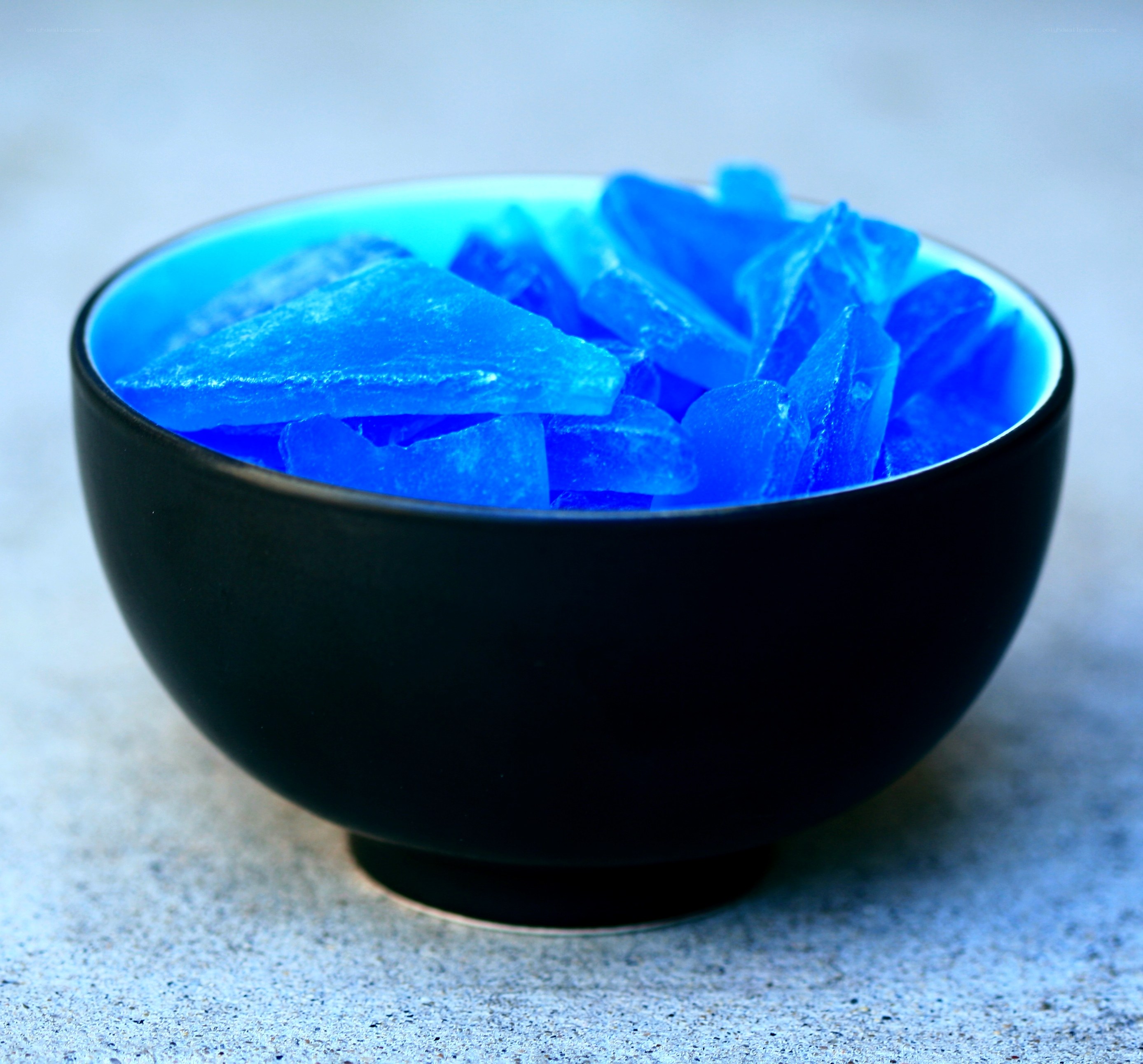 blue crystals in a bowl